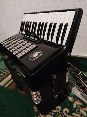гавайские музыкальные инструменты: Аккордеон Weltmeister - Клавиатура: фортепианная, 34 клавиши (3 — 1