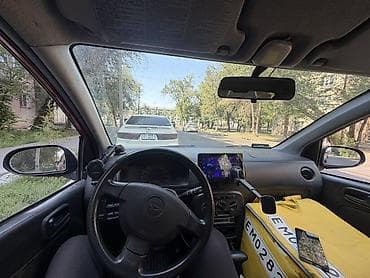 Daihatsu Cuore: 2004 г., 1 л, Автомат, Бензин, Хэтчбэк