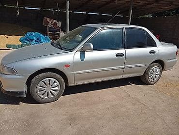 Транспорт: Mitsubishi Lancer: 1993 г., 1.6 л, Механика, Бензин, Седан — 2