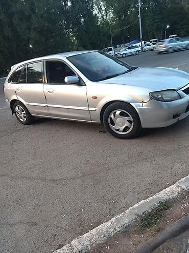 кия рио 2003: Mazda 323: 2003 г., 1.6 л, Механика, Бензин, Хэтчбэк — 2