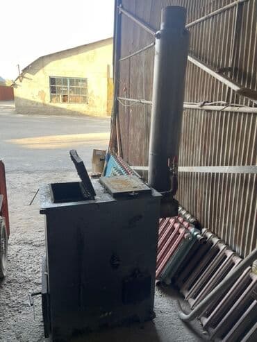 старинный самовар на дровах: Твердотопливный котёл/печь для отопления помещений расчитан до 400 км2 — 1