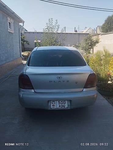 крыло калдина: Toyota Platz: 2001 г., Седан — 4