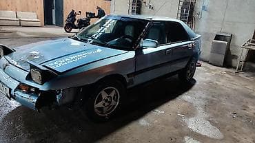 сг 9: Mazda 323: 1994 г., 1.6 л, Механика, Бензин, Лифтбек — 5