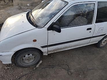 Унаа: Daihatsu Cuore: 1994 г., Кол менен иштөөчү, Бензин, Хетчбек — 2