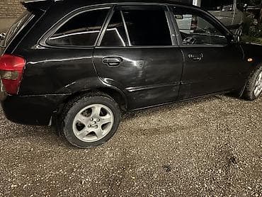 салон жасайбыз: Mazda 323: 2001 г., 1.6 л, Кол менен иштөөчү, Хетчбек — 4