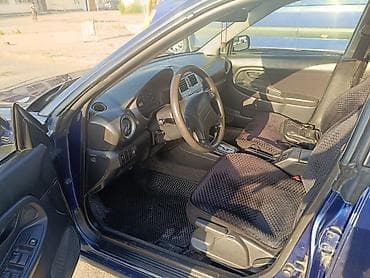 Продажа авто: Subaru Impreza: 2004 г., 1.6 л, Универсал — 6