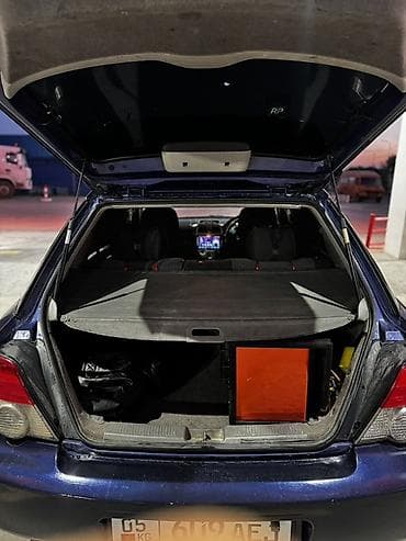 Subaru Impreza: 2003 г., 1.5 л, Автомат, Газ, Универсал — 10