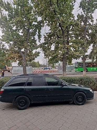 мазда каробка: Mazda Capella: 1998 г., 2 л, Автомат, Бензин, Универсал — 3