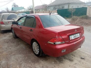 Ламинат: Mitsubishi Lancer: 2007 г., 1.3 л, Механика, Бензин, Седан — 9