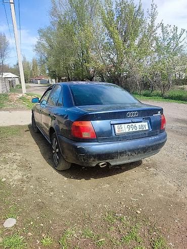 tesla model 3: Audi A4: 1996 г., Седан — 5