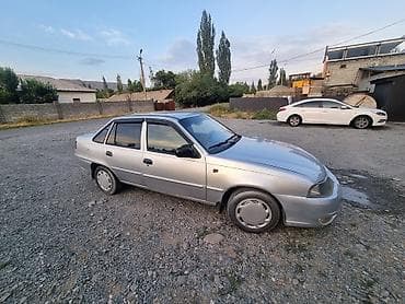 Унаа: Daewoo Nexia седан, серебристый цвет, 4 двери. Кузов и экстерьер: - — 2