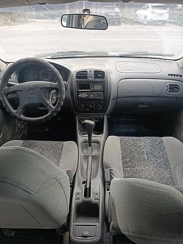 Mazda 323: 1999 г., 1.6 л, Автомат, Бензин, Хэтчбэк — 3