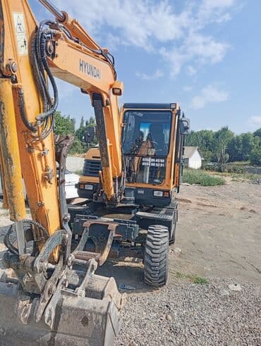 органайзеры для авто: Экскаватор, Hyundai, 2013 г., Колесный — 8