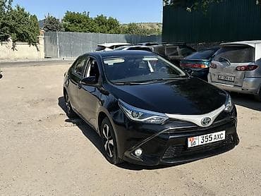 byd e7: Toyota Corolla: 2019 г., 1.8 л, Автомат, Гибрид, Седан — 1