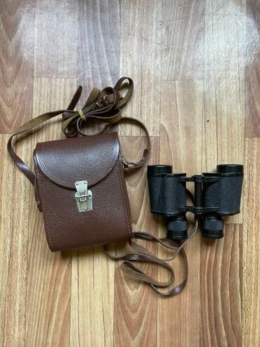 Бинокль с чехлом - Классическая призменная конструкция (Porro). -