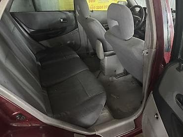 мицубиси колт: Mazda 323: 2002 г., 1.5 л, Механика, Бензин, Хэтчбэк — 7