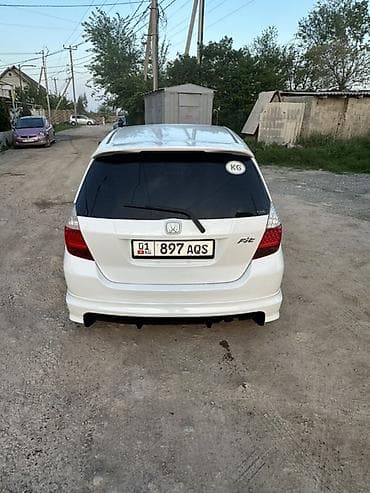 титан на фит: Honda Fit: 2003 г., 1.3 л, Вариатор, Бензин, Хэтчбэк — 6