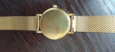 mi bend 6: Tissot T-Classic T143.210.33.021.00 — элегантные швейцарские наручные — 5