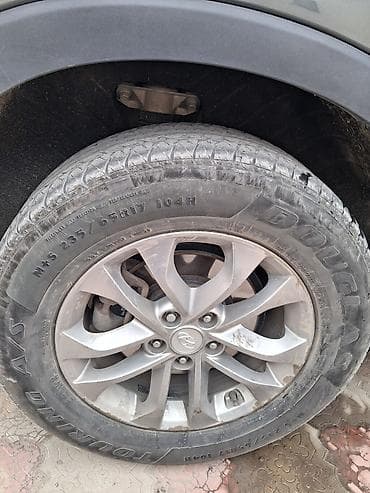 srv 2: Шины 235 / 65 / R 17, Всесезонная — 1