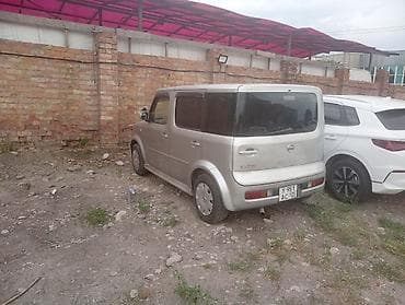 byd e7: Nissan Cube: 2002 г., Автомат, Бензин, Минивэн — 4