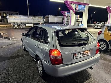 Mazda 323: 2002 г., 1.6 л, Автомат, Бензин, Хэтчбэк