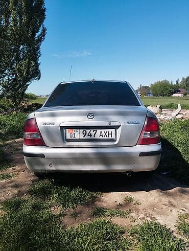 Продажа авто: Mazda 323: 1999 г., 1.6 л, Механика, Бензин, Седан — 2