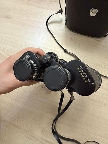 Бинокль 10x50, поле зрения 5°. Призменная схема Porro, просветлённая