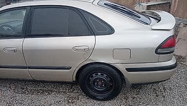 mercedes g: Легковой автомобиль седан с аэродинамическим спойлером на крышке — 5