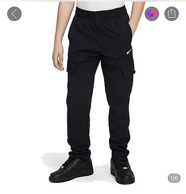 мужские брюки nike: Джинсы и брюки, цвет - Черный — 1