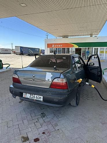 Транспорт: Daewoo Nexia: 2005 г., Механика, Бензин, Седан — 7
