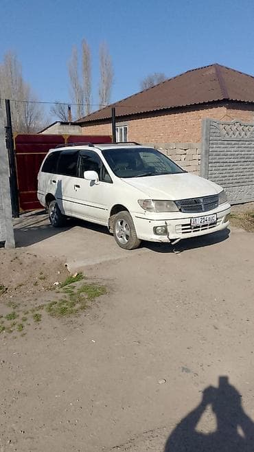 nissan moco: Просторный белый минивэн/универсал с правым рулём. Кузов 5‑дверный — 1