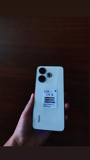 Redmi, Redmi 13, Б/у, 128 ГБ, цвет - Белый, 1 SIM, 2 SIM at lalafo.kg Redmi, Redmi 13, Б/у, 128 ГБ, цвет - Белый, 1 SIM, 2 SIM