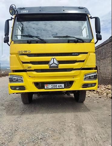 Унаа: Самосвал Howo (CNHTC) 371, желтый. - Колесная формула 6x4. - Мощность — 3