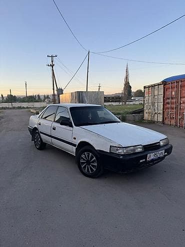step wgn: Mazda 626: 1990 г., 2 л, Механика, Бензин, Седан — 9