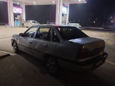 опель корса б: Daewoo Nexia: 1996 г., Механика, Бензин, Седан — 3