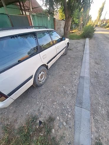 Транспорт: Mazda 626: 1993 г. — 2
