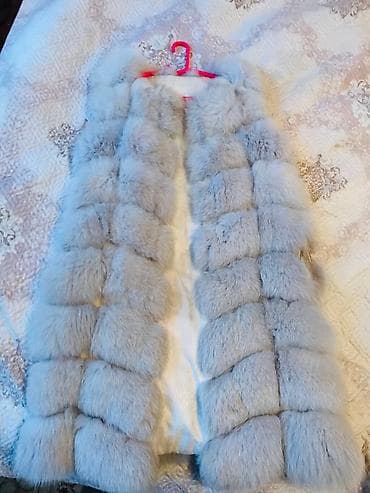 Продаю меховую безрукавку в хорошем состоянии