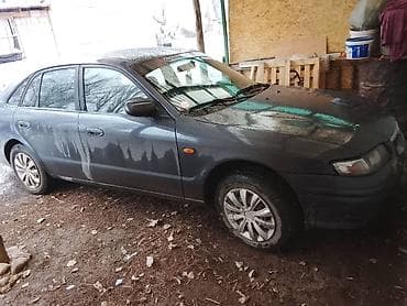 mazda cronos: Mazda 626: 1997 г., 1.8 л, Механика, Седан — 6