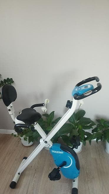 Велотренажёр складной Torneo - Компактная X-образная рама, легко