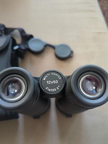 бинокил: Бинокль Celestron 12x50 из США. - Оптика: увеличение 12x, объективы — 2