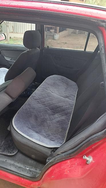 Унаа: Daewoo Nexia: 2011 г., 1.6 л, Кол менен иштөөчү, Бензин, Седан — 8