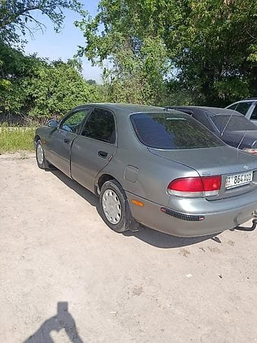 2 4 д: Mazda 626: 1996 г., 2 л, Механика, Бензин, Седан — 3