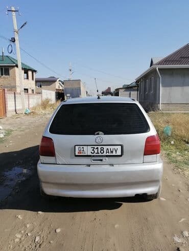 рассрочка ауди: Volkswagen Polo: 1998 г., 1.4 л, Автомат, Бензин, Хэтчбэк — 9