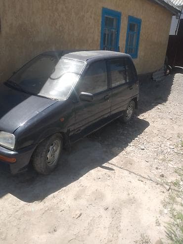 муравей с рулем: Daihatsu Cuore: 1995 г. — 2