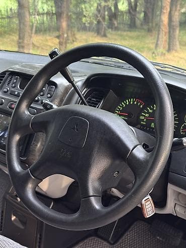 Транспорт: Mitsubishi Delica: 2003 г., 3 л, Бензин, Кроссовер — 9
