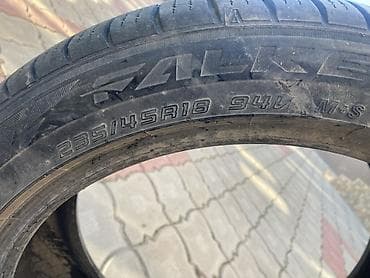 240: Шины 235 / 45 / R 18, Всесезонная, Легковые, Falken — 1