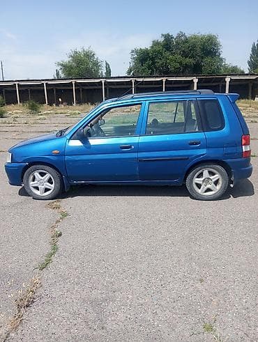 нарди руль: Mazda Demio: 1998 г., 1.3 л, Механика, Бензин, Хэтчбэк — 5