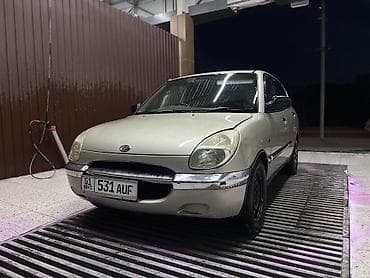 b v d: Daihatsu Storia: 1999 г., 0.9 л, Автомат, Бензин, Хэтчбэк — 3