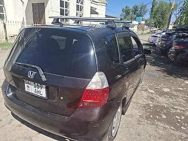 diska 14: Honda Fit: 2005 г., Хэтчбэк — 5