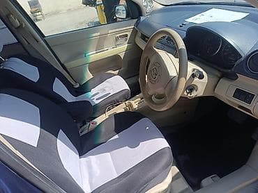 боковой: Mazda Demio: 2004 г., 1.5 л, Автомат, Бензин, Хэтчбэк — 5